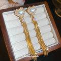 Iridescent Heart and Gold Chain Tassel Earrings with Polished Metal Details view 2