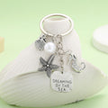 Silver-Tone Ocean Charm Keychain With Starfish, Seahorse, Shell And White Bead view 2
