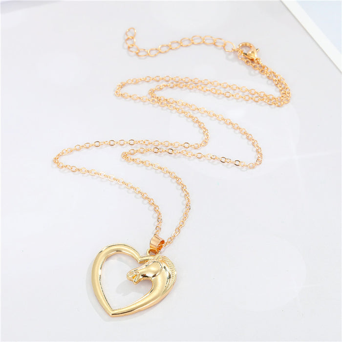 Gold Tone Open Heart and Horse Head Pendant Necklace with Curved Frame