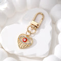 Gold Tone Rhinestone Open Heart Evil Eye Clip Keychains view 3