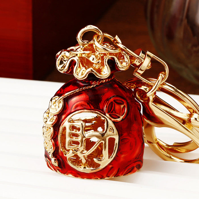 Jeweled Fortune Pouch Keychain with Red Enamel and Gold Tone Trim