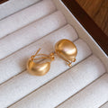 Brushed Curved Stud Earrings in Three Metallic Finishes view 6