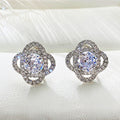 Round Swirl Halo Crystal Stud Earrings in Polished Metal view 1