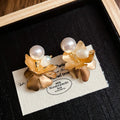 Gold Petal Stud Earrings with Irregular White Pearl Drops view 6