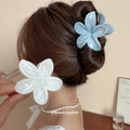 Four Blue And White Marbled Hair Claws In Standard Or Flower Shapes view 2