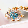 Jeweled Heart Pig and Winged Pig Keychains in Six Pictured Colors view 3