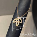 Crystal Leaf Pendant Necklace in Gold Tone Polished Metal Jewelry view 4