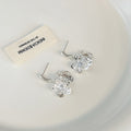Clear Faceted Flower Silver Tone Hoop Dangle Earrings view 3