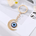 Gold and Silver Tone Round Moon and Key Evil Eye Split Ring Keychains view 8