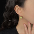 Gold Bamboo Leaf Drop Earrings Green Enamel Flower Charm view 2
