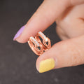 Twist Huggie Hoop Earrings Clear Stones White Rose Gold view 3