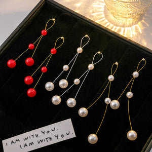 Long Looped Wire Drop Earrings with White or Red Pearl-Look Beads, Alloy