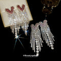 Crystal Heart Chandelier Earrings In Pink Magenta And Red view 2