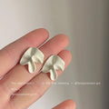 Ivory Matte Irregular Ruffle Petal Stud Earrings Pair view 4