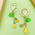 Strawberry, Cherry and Lemon Charm Keychains Featuring Red Apple Across 43 Variations view 3