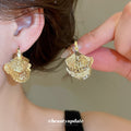 Gold Tone Butterfly Wing Hoop Earrings with Fine Openwork Texture view 1