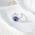 Blue Evil Eye Stud Earrings and Adjustable Rings in Four Finishes view 4