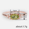 Olive Oval Three-Stone Ring In Rose And Silver Tones view 4