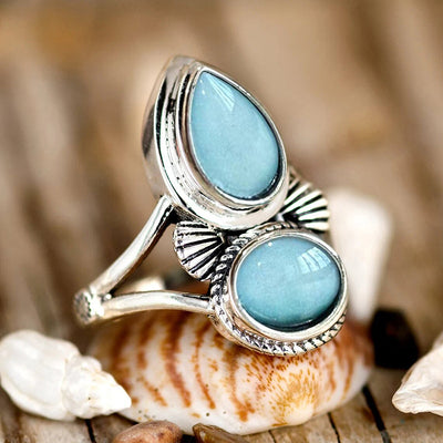 Antique silver dual blue shell cabochon ring on seashells