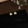 Gold Mini Flower Stud Earrings Radial Cut Facet Design view 3