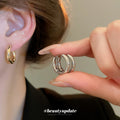 Polished Round Huggie Earrings in Silver Tone and Gold Tone view 2