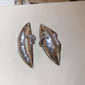 Sculptural Metal Lip Stud Earrings In Gold And Silver view 7