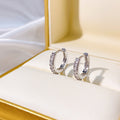 Small Silver Tone Crystal Row Huggie Hoop Earrings view 1