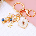 Mixed Jeweled Lock Clover Flower Butterfly and Rose Keychains in Forty One Styles view 3