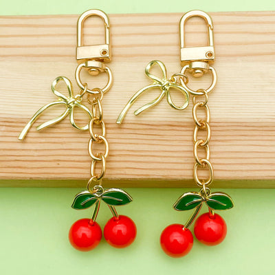 Image 1 showing cherry keychains shown in the product image.