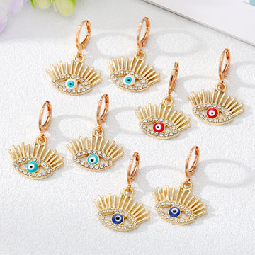 Gold and Silver Tone Crystal Lash Evil Eye Huggie Earrings