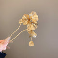 Gold Tone Flower Hair Pin With Textured Petals And Hanging Leaves view 6