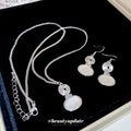 Silver Spiral Disc Oval Cabochon Necklace Earrings view 2