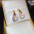 Gold Tone Organic Pearl Drop Earrings With Sculpted Top Detail view 6