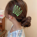 Glossy Enamel Openwork Oval Snap Hair Clips 4-Pack Black view 3