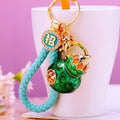 Lotus Gourd Keychains with Gold Tone Rings and Braided Straps view 1