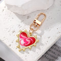 Gold Tone Pearl Heart Marbled Swirl Clip Keychains in Six Colors view 3