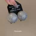Silver Tone Pavé Crystal Sphere Stud Earrings With Grid Texture view 4