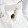 Gold Tone Pressed Flower Hamsa Lobster-Clasp Charms in Nine Options view 2
