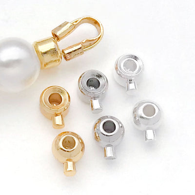 Rounded metal end caps in two shapes arranged as a full product overview