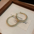 Textured Hoop Earrings in Five Gold and Silver Tone Styles view 6