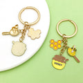 Bee and Honeycomb Charm Keychains Featuring Yellow Bee Across 33 Pictured Variations view 3