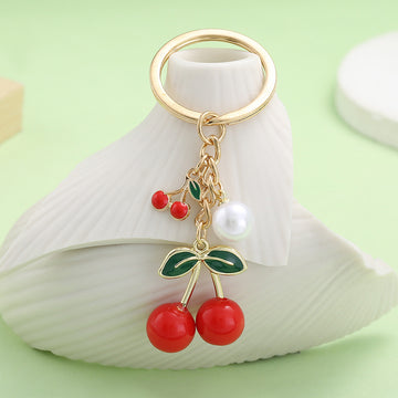 Cherry Charm Keychains Featuring Red Cherry Across 58 Pictured Variations