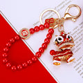 Chinese Fortune Charm Keychain Collection with Red Bead Loops view 1