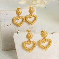 Textured Metal Open Heart Drop Earrings Gold and Steel view 2