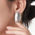 Ribbed Oval Dome Stud Earrings Gold Steel Finishes view 3