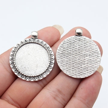 Leaf Border Round Cabochon Tray In Antique Silver And Antique Bronze For Jewelry Making