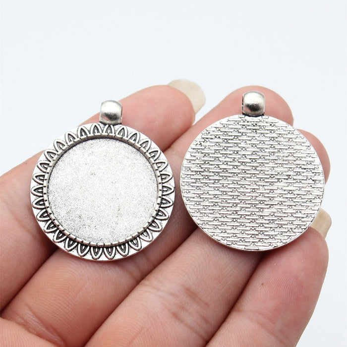 Leaf Border Round Cabochon Tray In Antique Silver And Antique Bronze For Jewelry Making