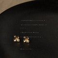 Gold Tone Matte Mini Four Petal Flower Stud Earrings For Women view 3