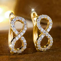 Gold Tone Crystal Pave Infinity Figure Eight Huggie Hoop Earrings view 2