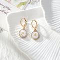 Gold Tone Rhinestone Round Pressed Flower Huggie Earrings in Nine Options view 11